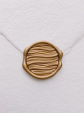 3D ocean waves design wax seal in gold on handmade paper envelope