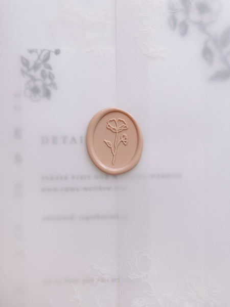 Oval flower wax seal in nude on vellum envelope