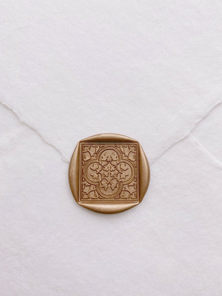 Moroccan tile pattern gold wax seal on handmade paper envelope