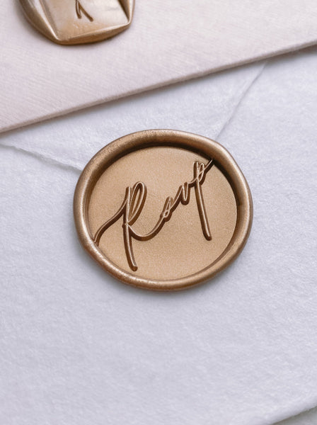 Calligraphy script rsvp wax seal in gold_side angle