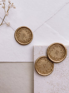 Floral crown single-initial round wax seals in gold