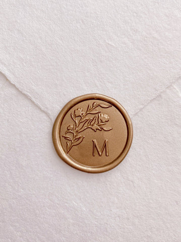 Floral silhouette single initial wax seal in gold