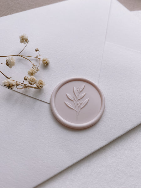 ivory nude colored leaf branch wax seal on paper envelope_side angle