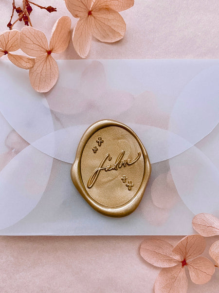 J'adore oval wax seal in gold on mini vellum envelope