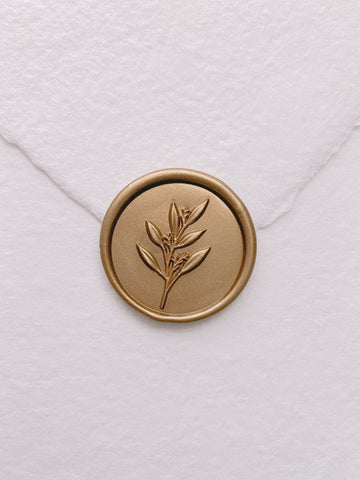 3D leaf branch wax seal in gold on handmade paper envelope_front angle