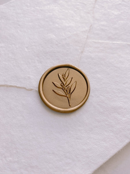 Leaf branch wax seal in gold_side angle