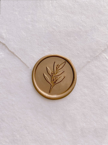 Leaf branch wax seal in gold_front angle