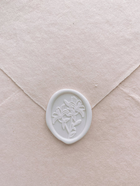 Oval lily floral white wax seal