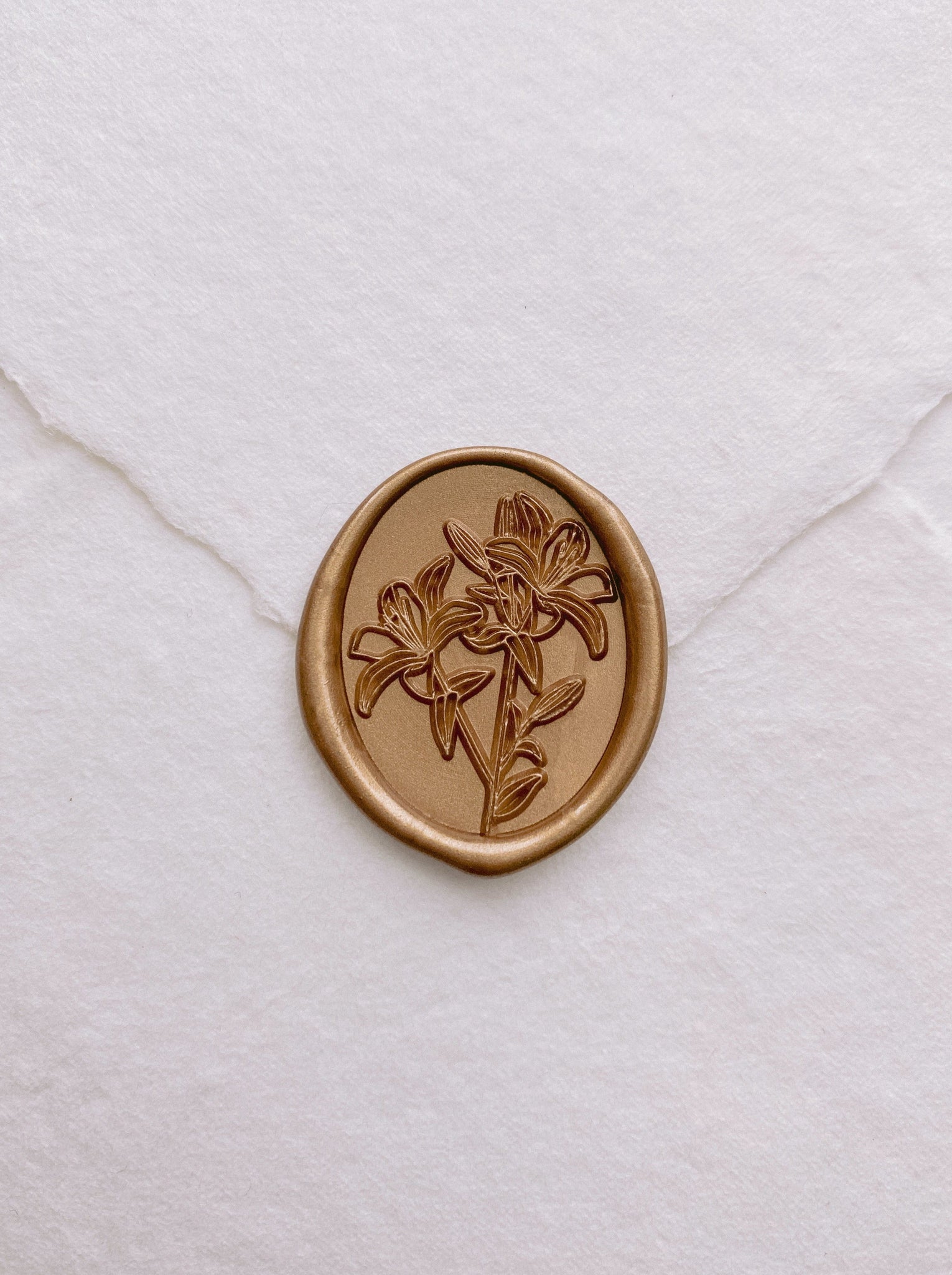 Oval lily floral gold wax seal