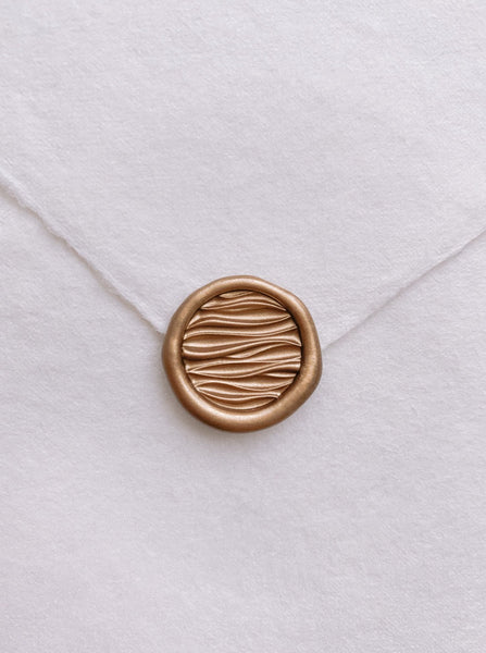 Mini 3D ocean waves wax seal in gold_front angle