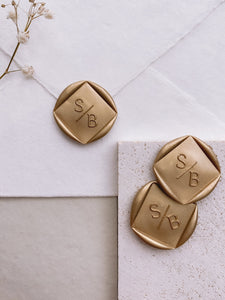 Modern monogram diamond shaped wax seals in gold
