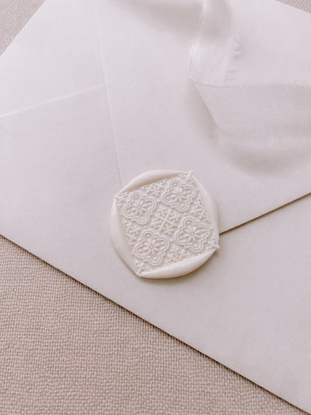 Moroccan tile pattern diamond shaped wax seal in antique white