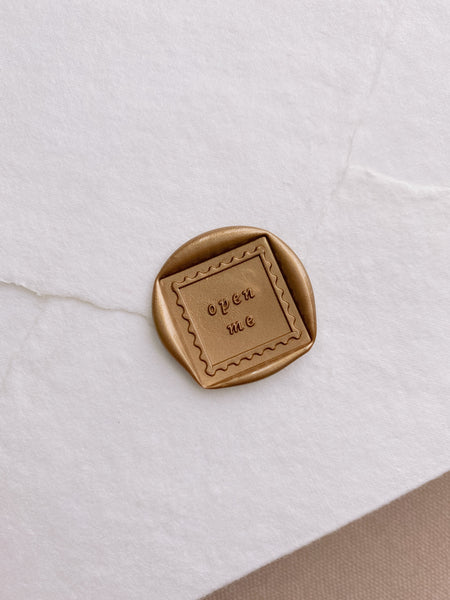 Open Me postage stamp design wax seal in gold