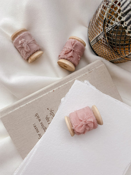 1 inch raw edge silk ribbon on wooden spools in color Pale Mauve, Dusty Blush and Blush