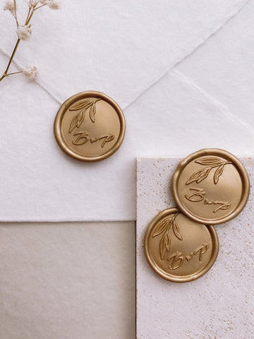 Simple leaf design monogram round wax seals in gold