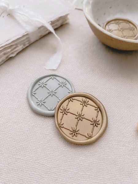 Daisy floral pattern wax seals in gold and light gray