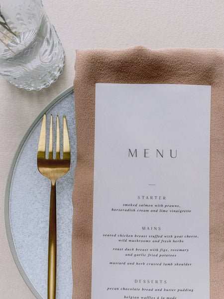 Vellum menu on table setting_front angle