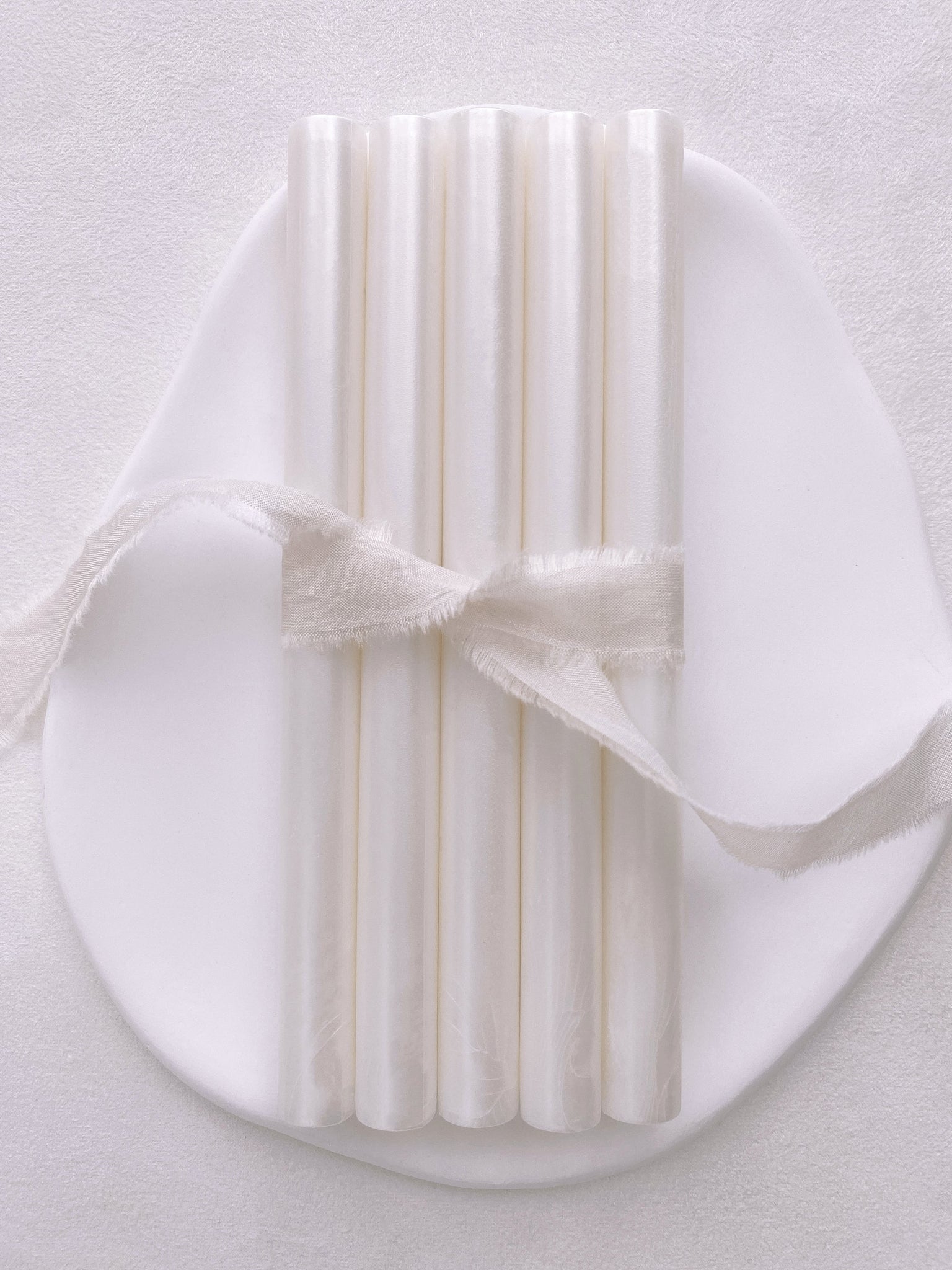 a set of 5 white pearl sealing wax sticks